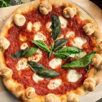 Margherita · San Marzano tomato sauce, fresh mozzarella, fresh basil.