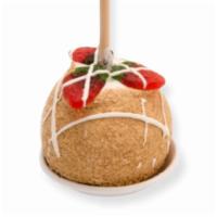 New York Cheesecake · Caramel apple covered in white chocolate, rolled in crushed graham crackers, drizzled with m...