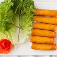 Crispy Egg Rolls · Savory mixture of ground pork, taro, glass noodles and carrot, wrapped on fried golden brown...