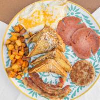 Breakfast Sampler · Two pancakes or french toast, two eggs any style, home fries, and taylor ham, bacon, and sau...