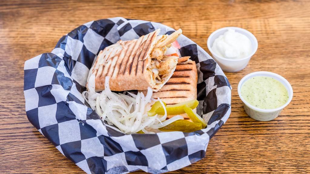 Chicken Pocket Pita Wrap · Halal. Roasted spiced chicken on revolving spit, sliced and cut into chunks.