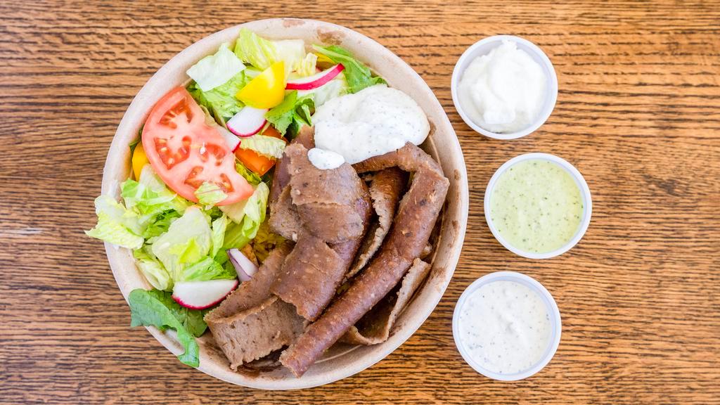Gyro Rice Bowl · Gluten-free, Halal. Beef & Lamb Meat. Thinly sliced meat combination (beef and lamb) on a rotisserie.