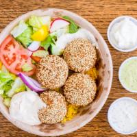 Falafel Rice Bowl · Gluten-free, Vegan, Halal. Mashed garbanzo beans (chickpeas)  made into fritters.