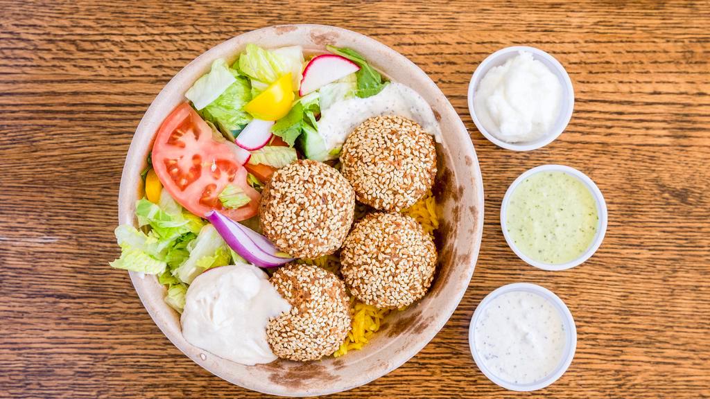 Falafel Rice Bowl · Gluten-free, Vegan, Halal. Mashed garbanzo beans (chickpeas)  made into fritters.