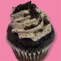 Oreo Cupcake · Decadent chocolate cake with Oreo Swiss meringue buttercream icing topped with a Oreo crunch.