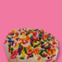 Vanilla Confetti Cupcake · Vanilla cake with our Swiss meringue buttercream icing and colorful sprinkles.