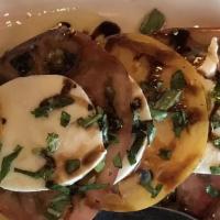 Fresh Mozzarella Caprese · Fresh Buffalo mozzarella, Hierloom tomatoes, olive oil and Balsamic glaze