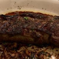New York Strip 14 Oz. · Certified Black Angus broiled with Amore Zip sauce
