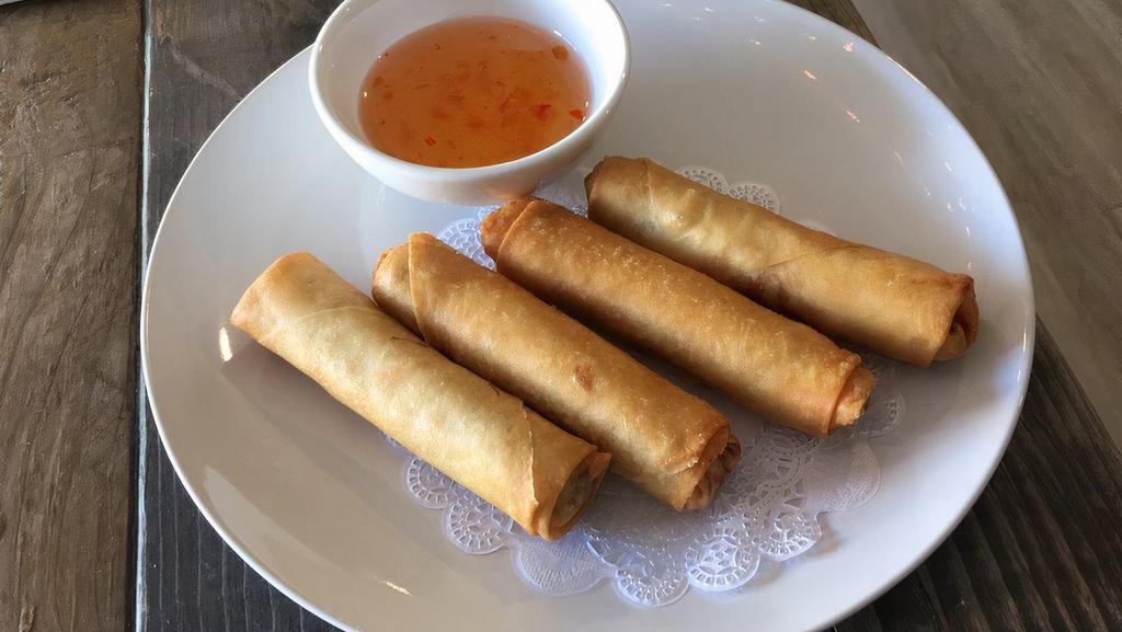Crispy Rolls · Rice paper, hand rolled w/ cabbage, carrots, glass noodles w/ dipping sweet & sour sauce.