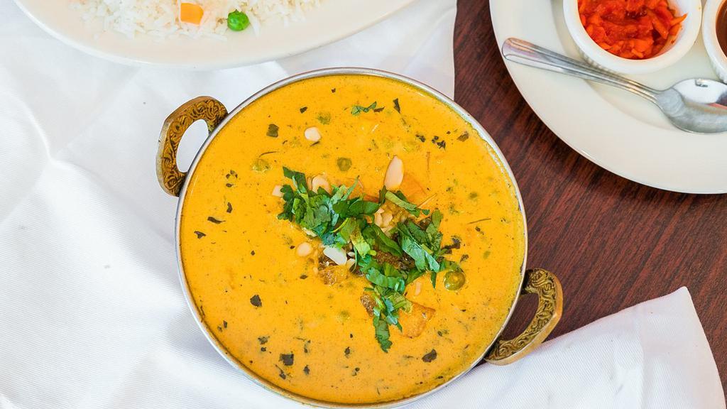 Matar Paneer · Green peas and Indian cottage cheese cooked with spices in a light creamy sauce.