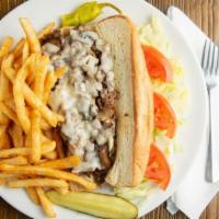 Cheese Steak · Beef or chicken thinly sliced and grilled with mushroom and onions, topped with melted mozza...