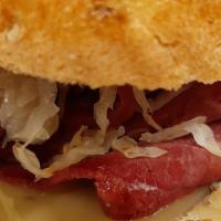 Classic Reuben · Thin slices of lean corned beef, sauerkraut, swiss cheese on grilled rye with Russian dressi...