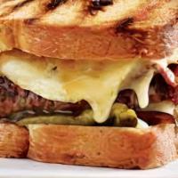 Fried Egg Patty Melt · Hamburger patty, two fried eggs, bacon, choice of cheese, tomato on choice of bread with spe...