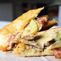 Kinda Cubano Sandwich W/ Mojo · Roasted Pork, Prosciutto, Housemade Dill Pickles, Dijon Mustard, and Monterey Jack Cheese pr...