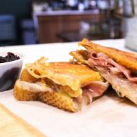 Monsieur Sandwich W/ Cran Jam · Prosciutto, Dijon Mustard, and House Blend Cheeses grilled on cheese crusted Farm-to-Market ...