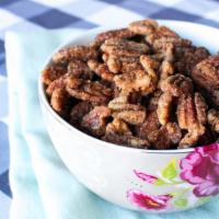Candied Pecans  · Pecans toasted and coated with brown sugar and warm spices. Comes in compostable 4 oz contai...