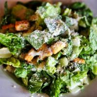 Caesar Salad · Crisp romaine, toasted garlic croutons, shaved parmesan cheese with creamy caesar dressing