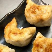 Pot Sticker · Six pc. Pan-fried dumpling