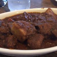 Beef Curry · Beef cooked with a delivery spiced curry sauce.