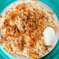 Chicken Dum Biryani · Basmati rice and tender pieces of richly saffron flavored chicken cooked with exotic Indian ...