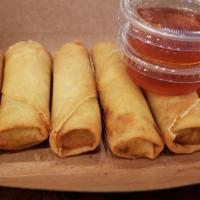 Crispy Spring Rolls · Veggies and glass noodles in a deep fried spring roll. Served with sweet chili sauce.