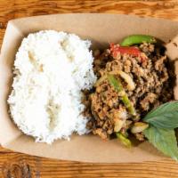 Spicy Basil Chicken · Ground chicken stir fried with red and green bell peppers, onions and basil.
