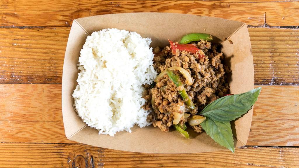 Spicy Basil Chicken · Ground chicken stir fried with red and green bell peppers, onions and basil.