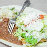 Flautas · 5 fried tacos stuffed with chicken and topped with lettuce, tomato, sour cream, and cheese. ...