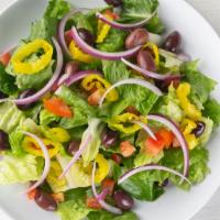 Greek Salad · Greek salad is served with banana peppers, feta cheese, fresh greens, house dressing, kalama...
