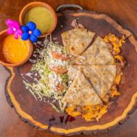 Quesadilla · 12” Flour tortilla filled with your choice of meat, cheese included, cooked until crispy and...