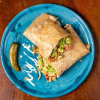 Burrito · 12” Flour tortilla cooked and toasted with your choice of meat,  refried beans, lettuce, tom...