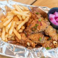 Wing Combo · Double-fried chicken wing combo with a choice of one flavor, one side, and homemade pickled ...
