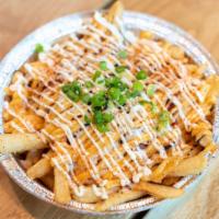 Kimchi Cheese Fries · French fries with stir-fried kimchi and melted mozzarella cheese dip.