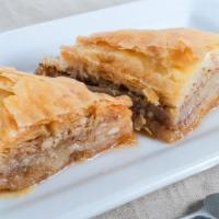 Baklava · Layers of thin pastry with walnuts, almonds, and pistachios with honey caramel