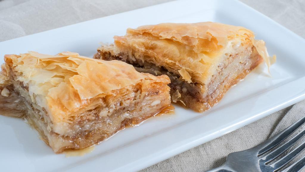 Baklava · Layers of thin pastry with walnuts, almonds, and pistachios with honey caramel