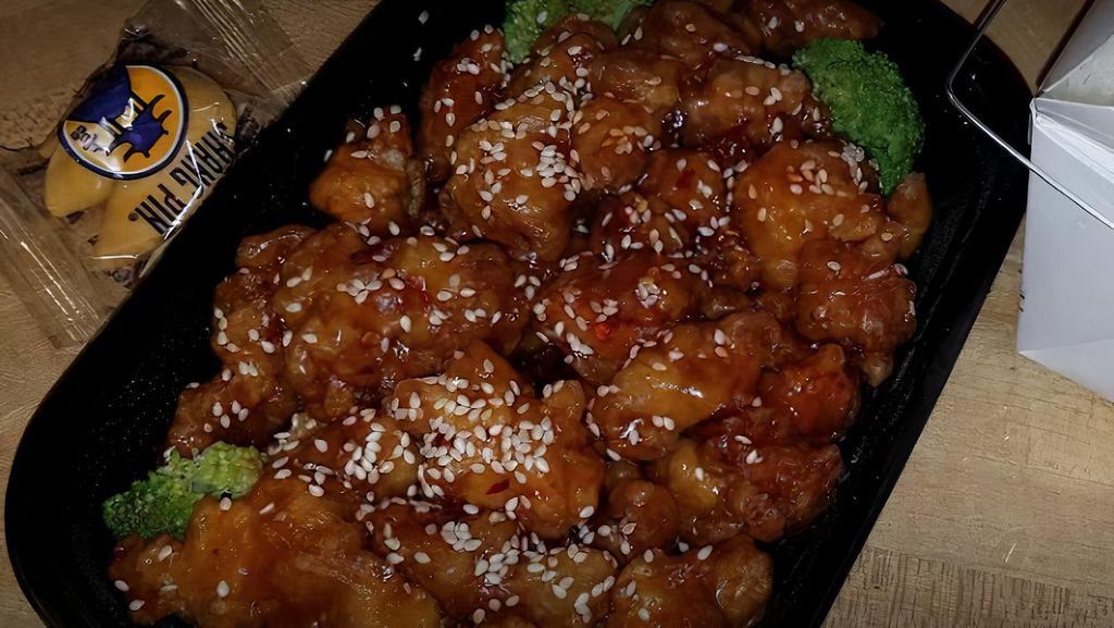 Sesame Chicken · Deep-fried, crispy boneless chicken in our house special sweet & hot spicy sauce with sesame flavor.
- Spicy