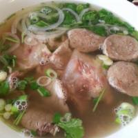 Pho With Rare Steak & Meatballs / Tái, Bò Viên · Large. Rare steak is served under cooked. Consuming raw or uncooked meat may increase your r...