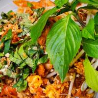 51 . Pad Thai · Stir-fried rice noodles with choices of tofu , chicken , pork , beef