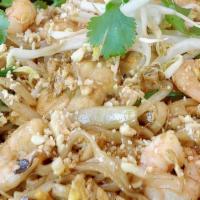 Pad Thai · Thin rice stick noodles, egg, green onions, yellow onions, bean sprouts, crushed peanuts, ci...