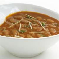 Rajma Masala · Red kidneys beans cooked in thick gravy with Indian whole spices. Come with Rice