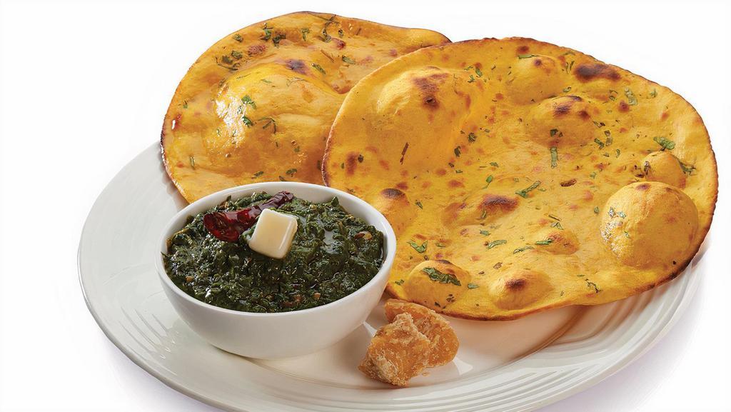 Sarso Ka Saag · Pureed tender mustard leaves cooked with Indian spices. Come with Rice
