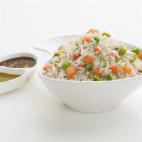 Veg Fried Rice · A dish of cooked rice mixed with stir-fried vegetables.