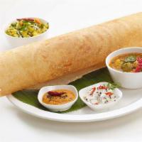 Masala Dosa · Thin pancake made from a fermented batter. It is similar to a crepe made of rice and black g...
