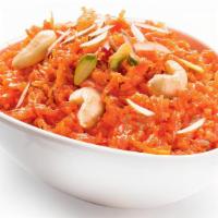Gajar Halwa · Mouthwatering Indian dessert made of grated carrots cooked gently in milk and sprinkled gene...