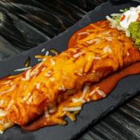 Big Boy Burrito · Large flour tortilla smothered in classic red
enchilada sauce and melted cheese. Filled with...