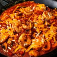 Arroz Con Camarones *Gf · Shrimp sautéed with onions, tomatoes,
mushrooms, and spices. Served over a bed of
Spanish ri...