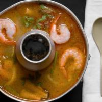 Tom Yum (Hot And Sour Soup) · Hot and sour spicy lemon grass soup, well-known Tom Yum in Thailand, cooked with a choice of...