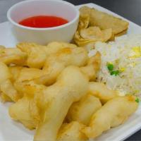 Sweet Sour Chicken/C 甜酸鸡 · Our combo come with one egg roll and two fried wontons.