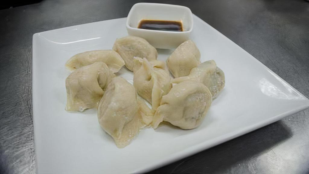 Steamed. Pork Chives Dumplings/水饺 · one order come 8  homemade dumplings