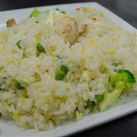 Vegetable Fr. Rice /菜炒饭 · fried rice with broccoli and mushrooms